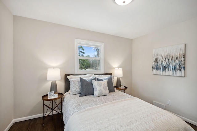 761 Labore Rd, Little Canada, MN 55117 - bedroom with baseboards and wood finished floors