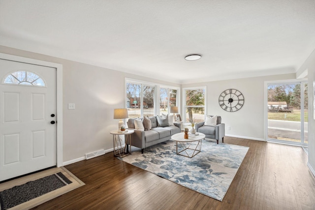 761 Labore Rd, Little Canada, MN 55117 - living area featuring baseboards and wood finished floors