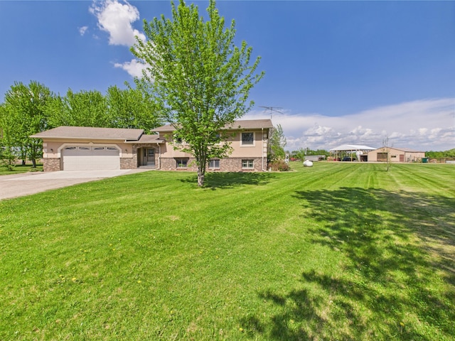31528 63rd St, Royalton, MN 56373 - view of front facade featuring a garage, a front yard, and concrete driveway