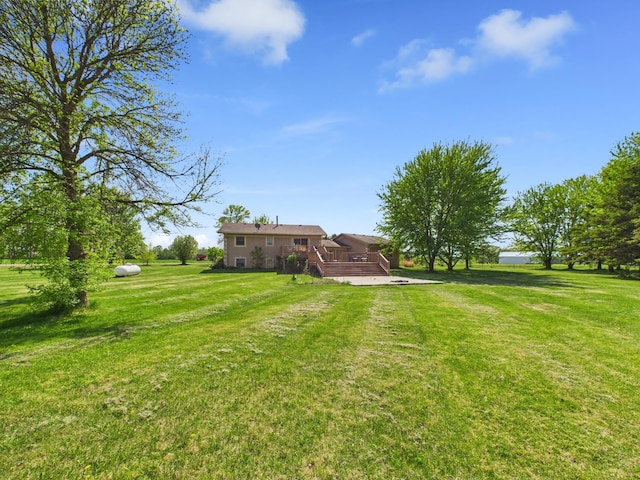 31528 63rd St, Royalton, MN 56373 - view of green lawn featuring a wooden deck