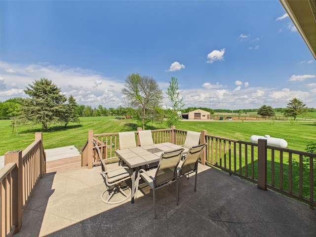 31528 63rd St, Royalton, MN 56373 - view of patio featuring outdoor dining area, a wooden deck, and a rural view
