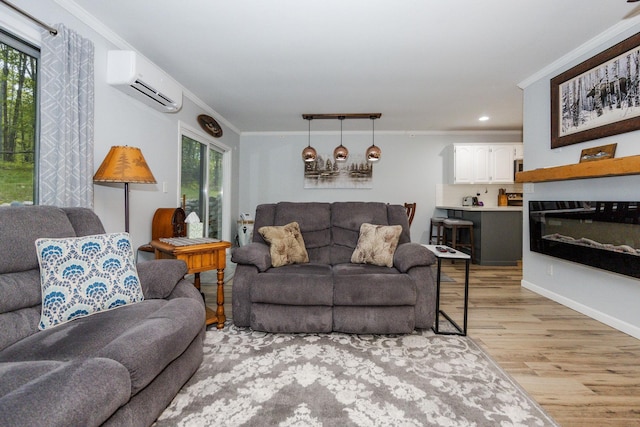 30202 Shady Ln, Detroit Lakes, MN 56501 - living area featuring an AC wall unit, light wood-style floors, crown molding, plenty of natural light, and recessed lighting