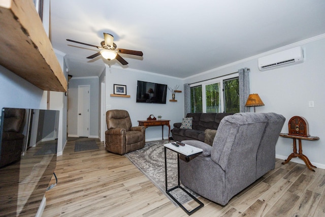 30202 Shady Ln, Detroit Lakes, MN 56501 - living room featuring an AC wall unit, light wood-style floors, crown molding, a ceiling fan, and baseboards