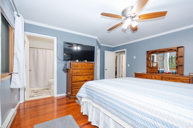 30202 Shady Ln, Detroit Lakes, MN 56501 - bedroom featuring wood finished floors, ornamental molding, a baseboard radiator, baseboards, and a ceiling fan