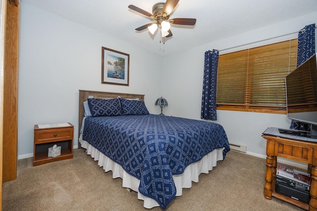 30202 Shady Ln, Detroit Lakes, MN 56501 - carpeted bedroom with baseboard heating, baseboards, and a ceiling fan