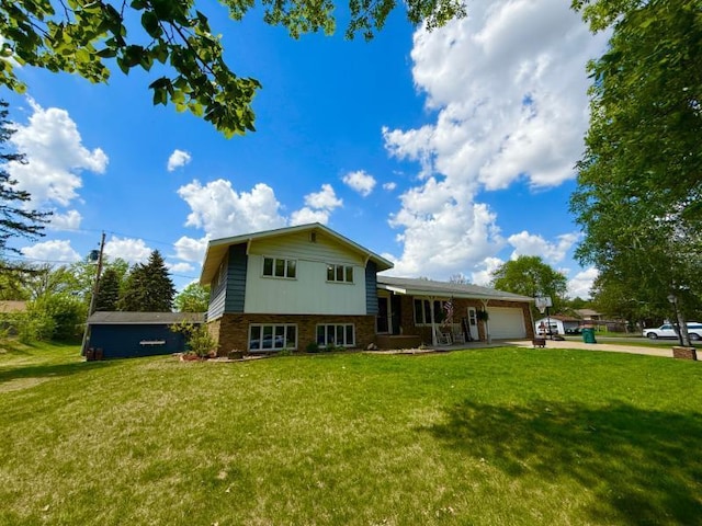 725 8th St NE, Staples, MN 56479 - rear view of house featuring an attached garage, a yard, and brick siding