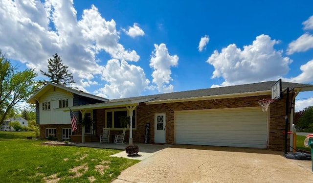 725 8th St NE, Staples, MN 56479 - split level home featuring brick siding, a garage, concrete driveway, and a front lawn