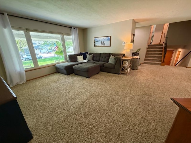 725 8th St NE, Staples, MN 56479 - carpeted living room with stairway