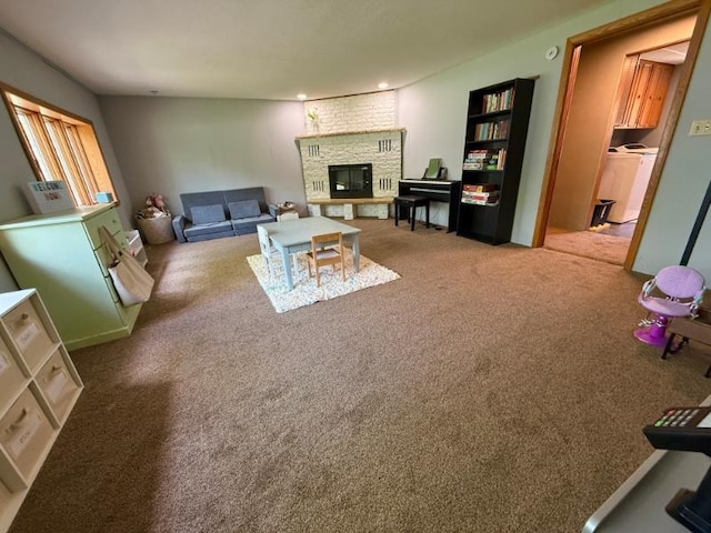 725 8th St NE, Staples, MN 56479 - living room featuring a fireplace and carpet flooring