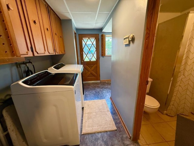 725 8th St NE, Staples, MN 56479 - laundry room featuring washing machine and clothes dryer and baseboards