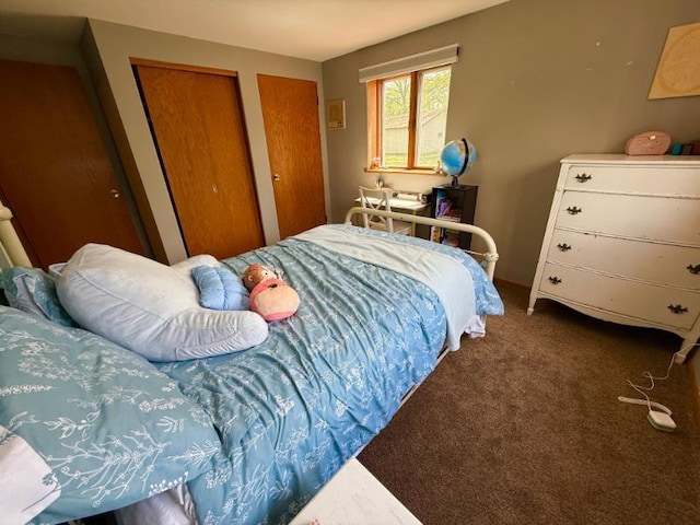 725 8th St NE, Staples, MN 56479 - carpeted bedroom featuring multiple closets