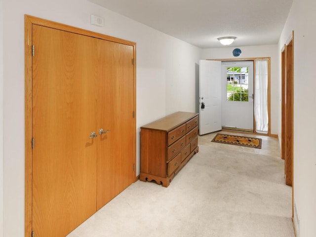 1232 Cypress Dr W, Annandale, MN 55302 - doorway to outside featuring light colored carpet