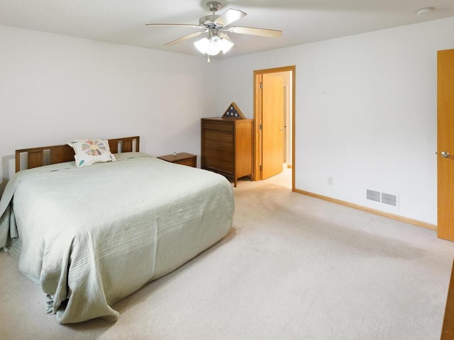 1232 Cypress Dr W, Annandale, MN 55302 - bedroom with light carpet, baseboards, and ceiling fan