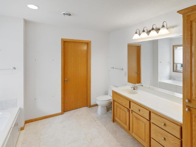 1232 Cypress Dr W, Annandale, MN 55302 - bathroom with a bath, toilet, vanity, and baseboards