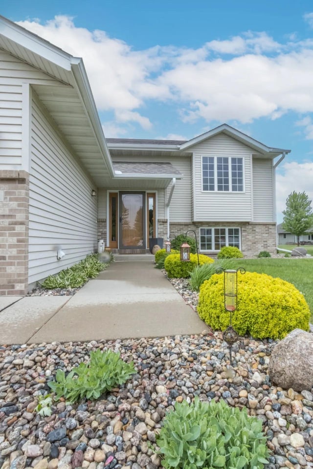 124 Waynesborough Way, Mankato, MN 56001 - doorway to property featuring brick siding