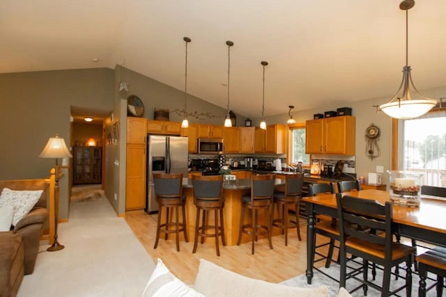 124 Waynesborough Way, Mankato, MN 56001 - dining room featuring vaulted ceiling and plenty of natural light