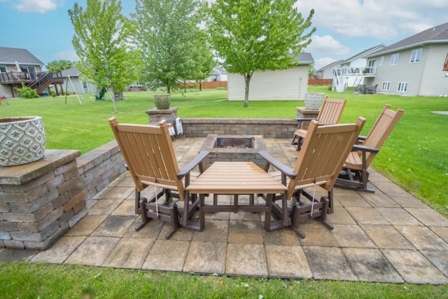 124 Waynesborough Way, Mankato, MN 56001 - view of patio / terrace featuring a fire pit and a residential view