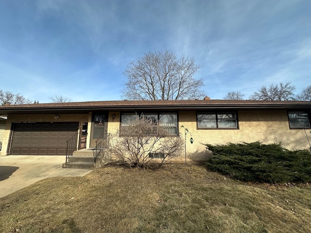 2814 Matilda St, Roseville, MN 55113 - ranch-style house featuring an attached garage, concrete driveway, and stucco siding