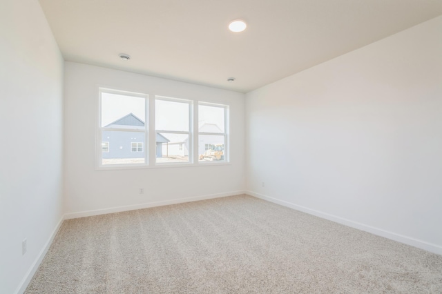 11454 Fieldstone Dr, Rogers, MN 55311 - carpeted empty room with baseboards