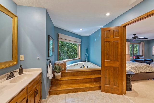 9378 Olympia Dr, Eden Prairie, MN 55347 - full bath with vanity, a whirlpool tub, connected bathroom, tile patterned floors, and recessed lighting