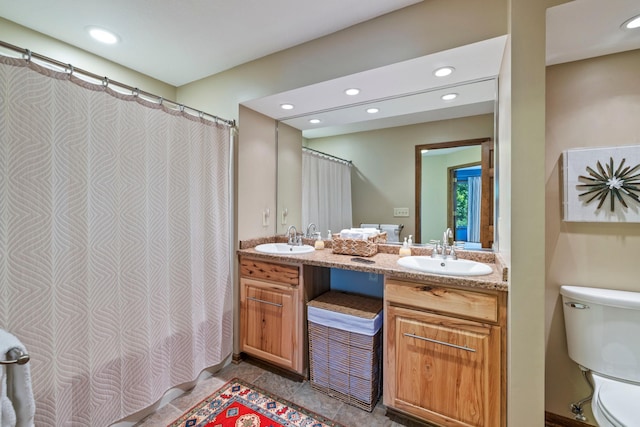 9378 Olympia Dr, Eden Prairie, MN 55347 - full bathroom featuring recessed lighting and double vanity