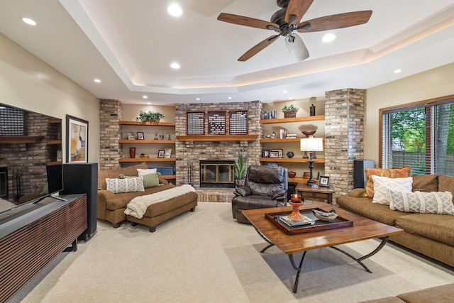 9378 Olympia Dr, Eden Prairie, MN 55347 - living room with a fireplace, recessed lighting, a tray ceiling, and a ceiling fan