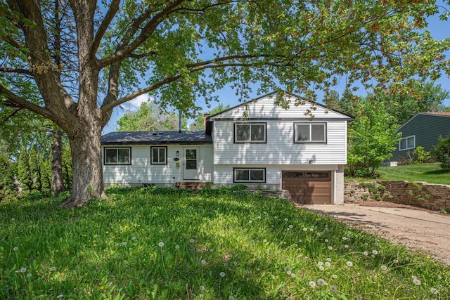 3633 Robinwood Ter, Minnetonka, MN 55305 - split level home featuring concrete driveway and an attached garage
