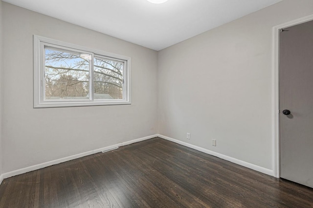 3633 Robinwood Ter, Minnetonka, MN 55305 - unfurnished room with wood finished floors and baseboards