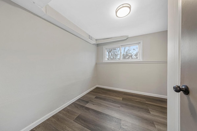 3633 Robinwood Ter, Minnetonka, MN 55305 - spare room featuring baseboards and dark wood-style floors