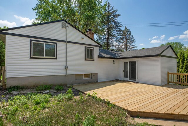 3633 Robinwood Ter, Minnetonka, MN 55305 - rear view of house with a chimney and a wooden deck