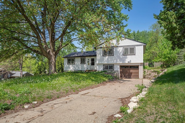 3633 Robinwood Ter, Minnetonka, MN 55305 - tri-level home featuring driveway and an attached garage