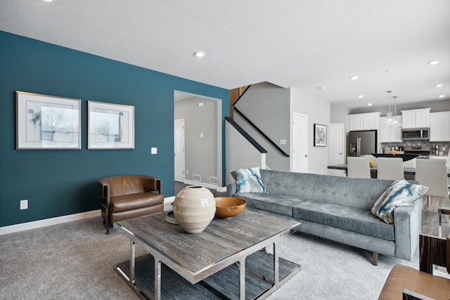 7581 Norway Ln, Lino Lakes, MN 55038 - living area featuring recessed lighting, baseboards, light carpet, a chandelier, and stairway