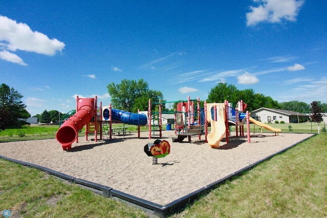 community play area with a lawn