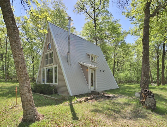 28435 392nd St, Browerville, MN 56438 - view of front of property featuring a front yard, metal roof, and entry steps