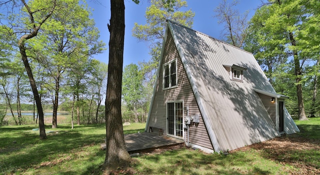 28435 392nd St, Browerville, MN 56438 - view of side of property featuring a deck with water view and a yard