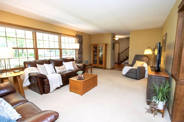 196 Mary Cir, North Mankato, MN 56003 - living area with carpet floors and stairway