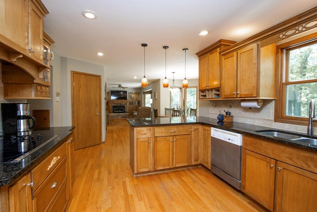 196 Mary Cir, North Mankato, MN 56003 - kitchen with dishwasher, brown cabinetry, a peninsula, a sink, and light wood-type flooring