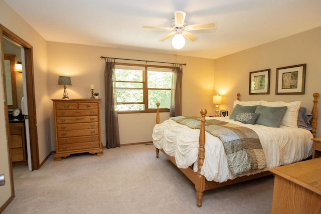 196 Mary Cir, North Mankato, MN 56003 - bedroom with baseboards, light colored carpet, and ceiling fan