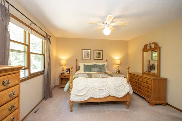 196 Mary Cir, North Mankato, MN 56003 - bedroom featuring light colored carpet, baseboards, and a ceiling fan