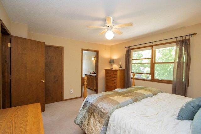 196 Mary Cir, North Mankato, MN 56003 - bedroom featuring light colored carpet, connected bathroom, and ceiling fan
