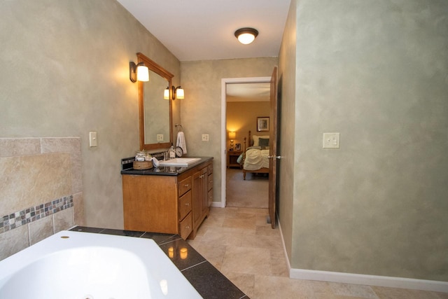 196 Mary Cir, North Mankato, MN 56003 - full bath with ensuite bathroom, vanity, a whirlpool tub, and tile patterned flooring