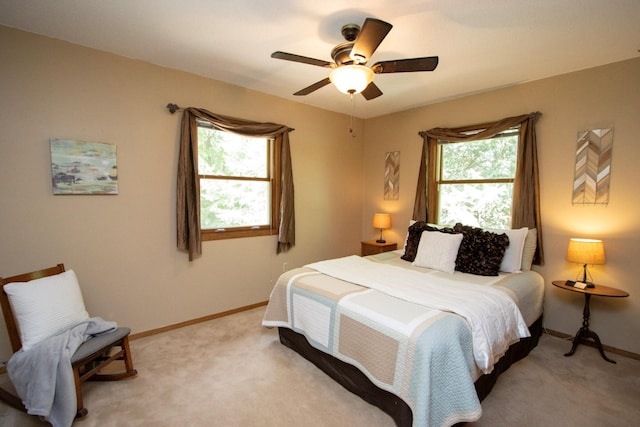 196 Mary Cir, North Mankato, MN 56003 - bedroom featuring light carpet, baseboards, and ceiling fan