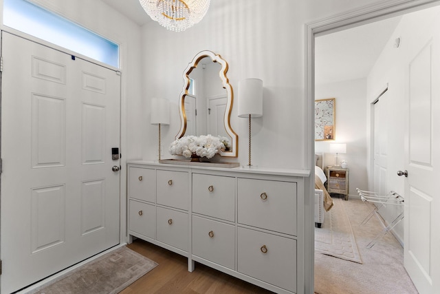 870 Mount Curve Blvd Unit F, Saint Paul, MN 55116 - foyer entrance with a chandelier