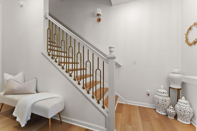 870 Mount Curve Blvd Unit F, Saint Paul, MN 55116 - stairway featuring wood finished floors and baseboards
