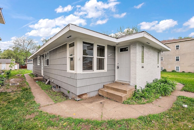 4625 Lyndale Ave N, Minneapolis, MN 55412 - view of front of home featuring brick siding