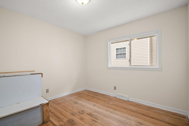 4625 Lyndale Ave N, Minneapolis, MN 55412 - empty room with light wood-style flooring and baseboards