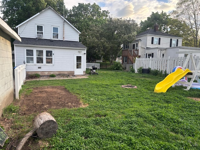 2428 14th Ave E, North Saint Paul, MN 55109 - view of yard featuring a playground and central air condition unit