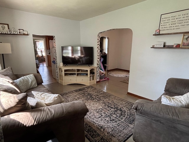 2428 14th Ave E, North Saint Paul, MN 55109 - living room featuring wood finished floors and baseboards