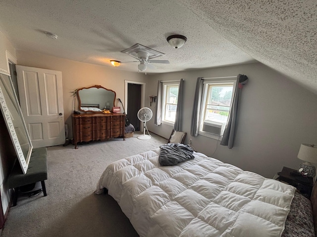 2428 14th Ave E, North Saint Paul, MN 55109 - carpeted bedroom featuring a textured ceiling, lofted ceiling, and a ceiling fan