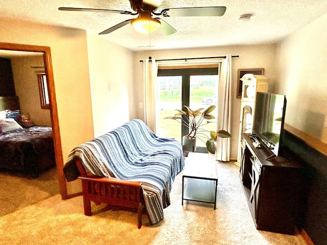 6640 Falstaff Rd, Woodbury, MN 55125 - living room with a textured ceiling, ceiling fan, and light colored carpet